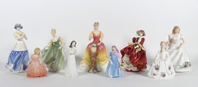 Lot 161 - A collection of Royal Doulton figures of...