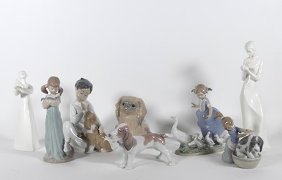 Lot 151 - A collection of Lladro figures, to include...