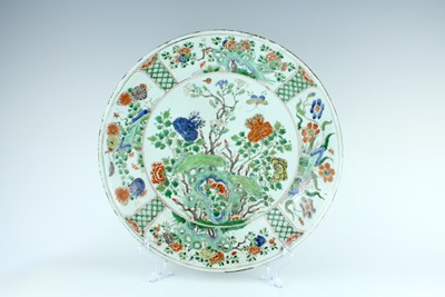 Lot 184 - A large Chinese famille verte ‘floral’ dish,...