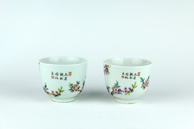 Lot 207 - A pair of Chinese famille rose wine cups with...