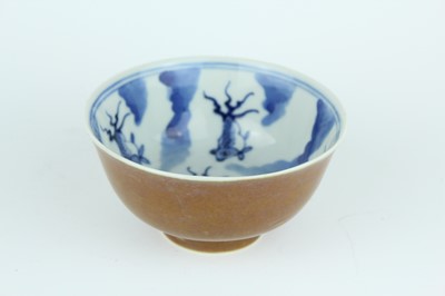 Lot 163 - A pair of Chinese iron-brown glazed and...