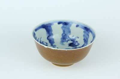 Lot 163 - A pair of Chinese iron-brown glazed and...