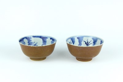 Lot 163 - A pair of Chinese iron-brown glazed and...