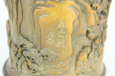 Lot 50 - A Chinese bamboo “figural” brush pot, Qing...