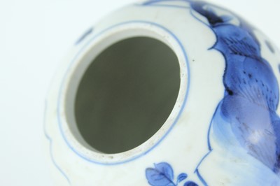 Lot 21 - A Chinese blue and white jar with lid, Qing...