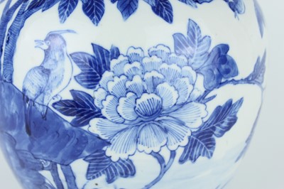 Lot 1 - A Chinese blue and white jar with cover, Qing...