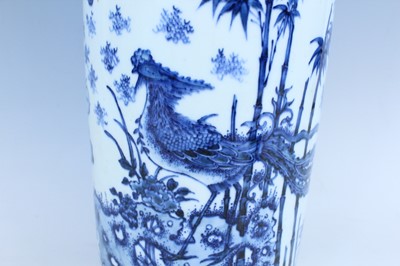 Lot 23 - A Chinese blue and white cylindrical vase, in...