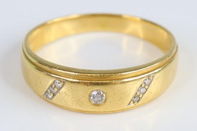 Lot 2666 - A yellow metal diamond set D shaped wedding...