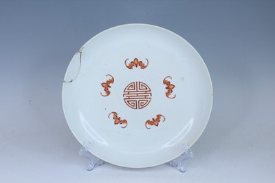 Lot 176 - A Chinese iron-red and gilt decorated dish,...