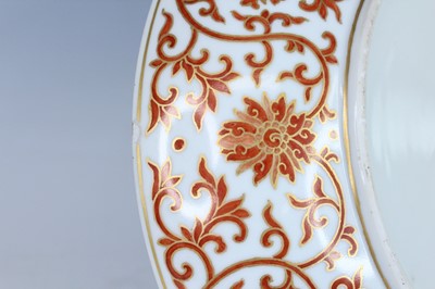 Lot 176 - A Chinese iron-red and gilt decorated dish,...