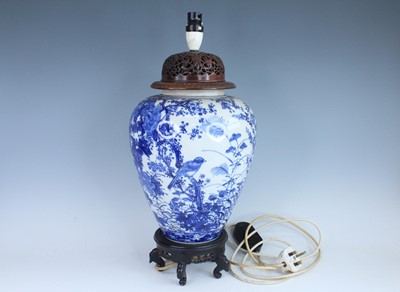 Lot 236 - A Japanese Arita blue and white baluster vase,...
