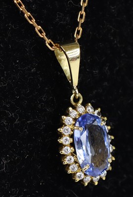 Lot 2657 - A 9ct yellow gold synthetic spinel and topaz...
