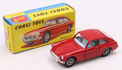 Lot 1348 - Corgi Toys No. 327 M.G.B GT in red with wire...