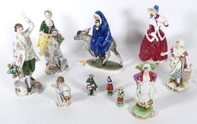 Lot 139 - A pair of Sitzendorf porcelain figures of a...
