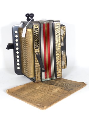 Lot 102 - A Hohner accordian, having a gilt decorated...