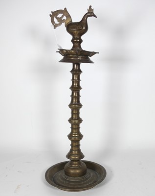 Lot 128 - A 19th century Indian brass Pooja lamp,...