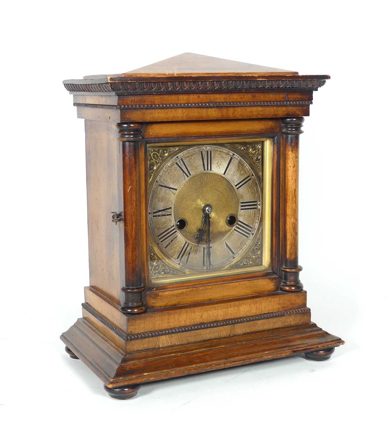 Lot 19 - A 19th century walnut cased mantel clock, of...