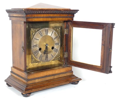 Lot 19 - A 19th century walnut cased mantel clock, of...