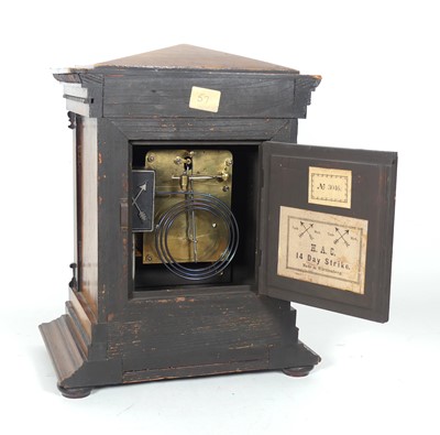 Lot 19 - A 19th century walnut cased mantel clock, of...