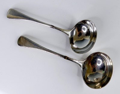 Lot 2103 - A pair of George III silver sauce ladles, in...