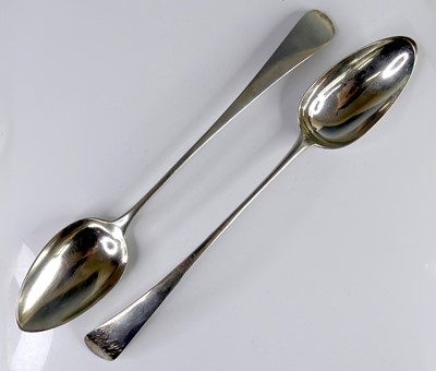 Lot 2107 - Two George III silver serving spoons by the...