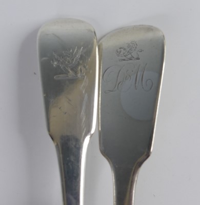 Lot 2090 - Two Georgian silver stuffing spoons, in the...
