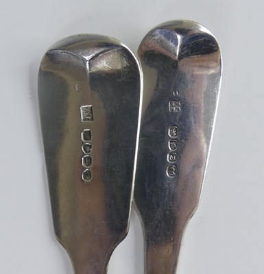 Lot 2090 - Two Georgian silver stuffing spoons, in the...