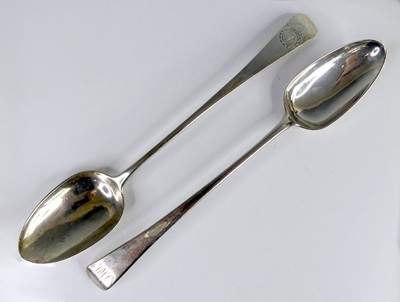 Lot 2089 - Two George III silver serving spoons, in the...