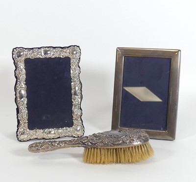 Lot 174 - An Elizabeth II silver clad repousse decorated...