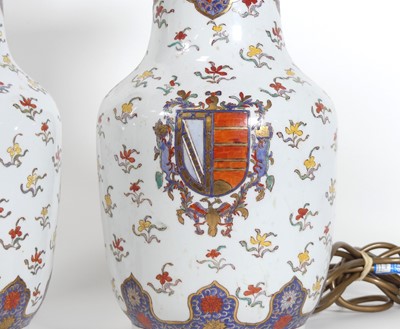 Lot 8 - A pair of Chinese style armorial porcelain...