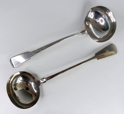 Lot 2102 - A George III silver soup ladle, in the Fiddle...