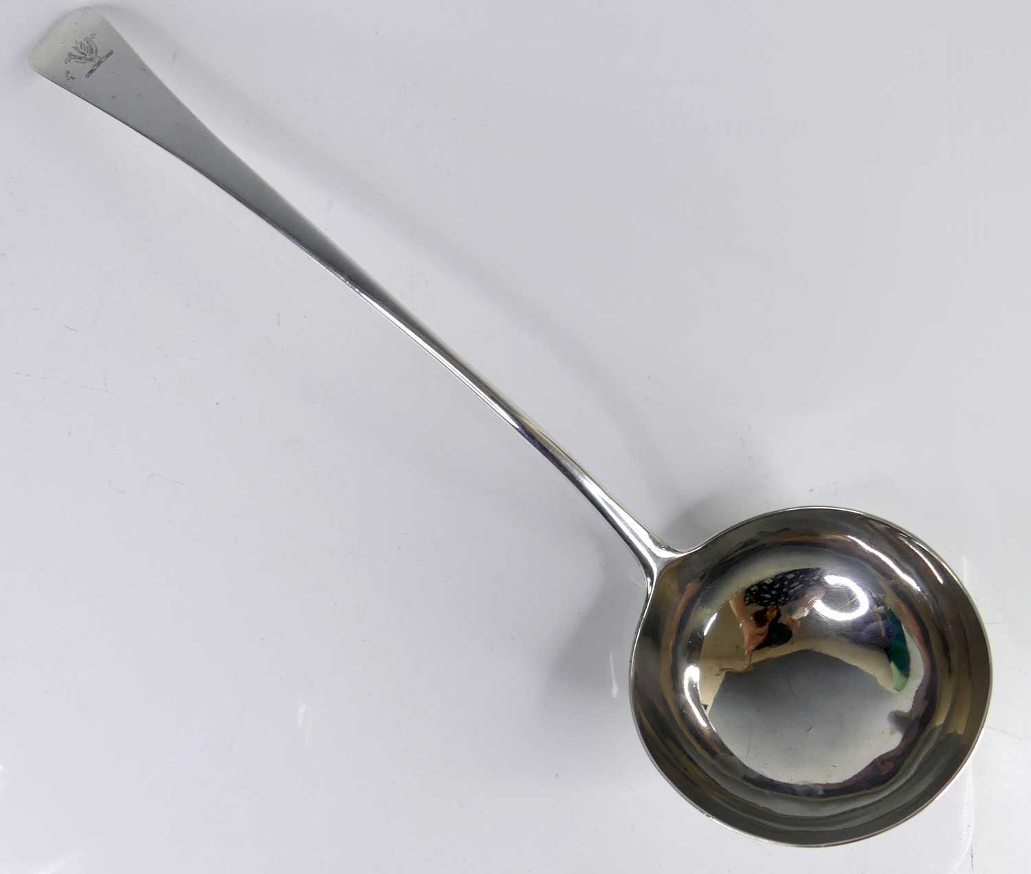 Lot 2101 - An early George III silver soup ladle, in the...