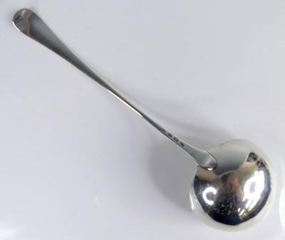 Lot 2101 - An early George III silver soup ladle, in the...