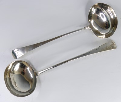 Lot 2106 - Two George III silver soup ladles, in the old...