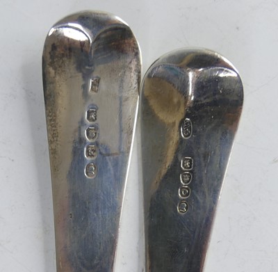 Lot 2106 - Two George III silver soup ladles, in the old...