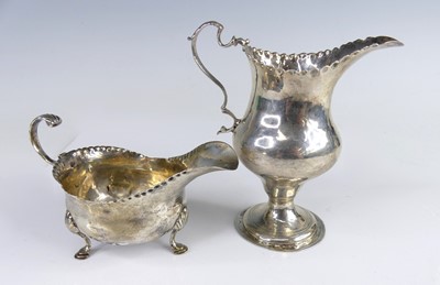Lot 2122 - Two pieces of George III silver tableware,...