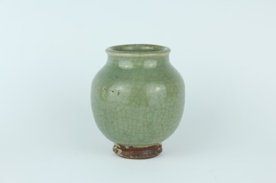 Lot 100 - A Chinese Longquan celadon jar, Ming Dynasty...