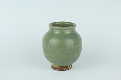 Lot 100 - A Chinese Longquan celadon jar, Ming Dynasty...