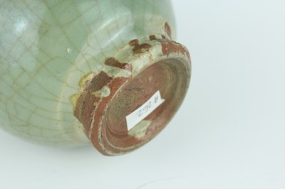 Lot 100 - A Chinese Longquan celadon jar, Ming Dynasty...