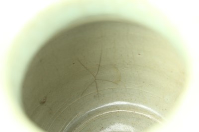 Lot 100 - A Chinese Longquan celadon jar, Ming Dynasty...