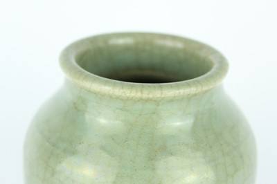 Lot 100 - A Chinese Longquan celadon jar, Ming Dynasty...
