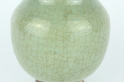 Lot 100 - A Chinese Longquan celadon jar, Ming Dynasty...