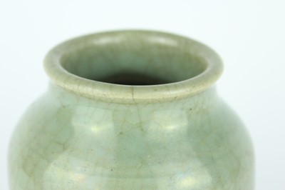 Lot 100 - A Chinese Longquan celadon jar, Ming Dynasty...