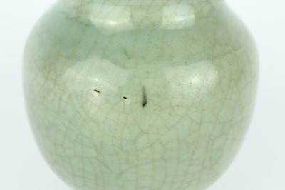 Lot 100 - A Chinese Longquan celadon jar, Ming Dynasty...
