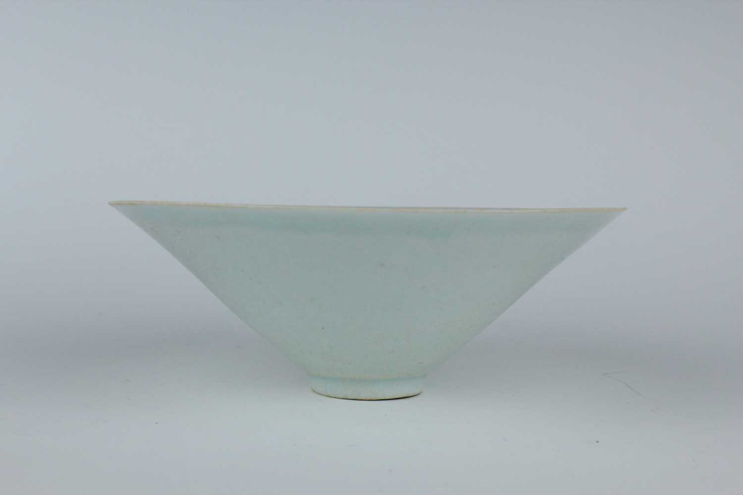 Lot 110 - A Chinese Qingbai bowl with carved foliage...