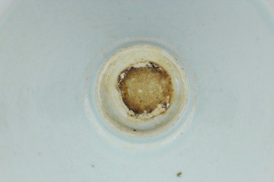 Lot 110 - A Chinese Qingbai bowl with carved foliage...