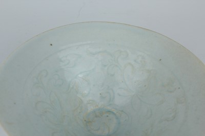 Lot 110 - A Chinese Qingbai bowl with carved foliage...