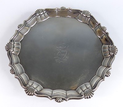 Lot 2227 - A George III silver card waiter, having shell...