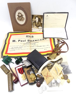 Lot 468 - A collection of military items and ephemera to...
