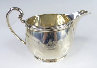 Lot 2121 - A George VI silver sparrowbeak cream, jug,...